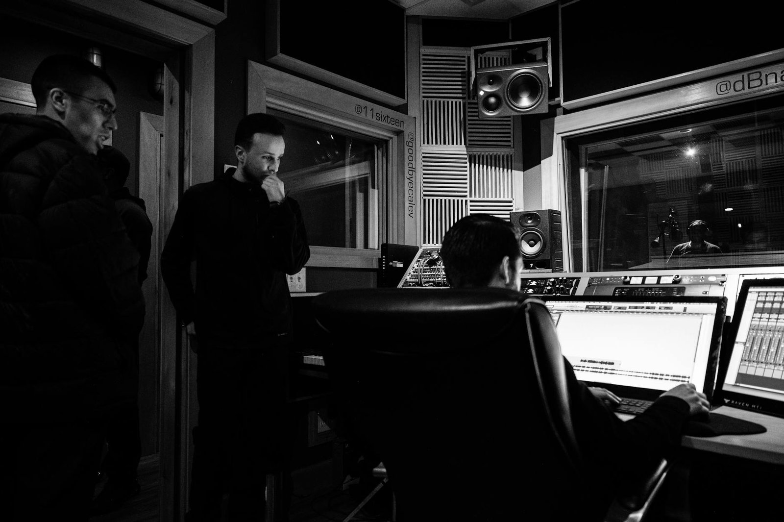 sound engineer creating musical arrangement on computer in recording studio
